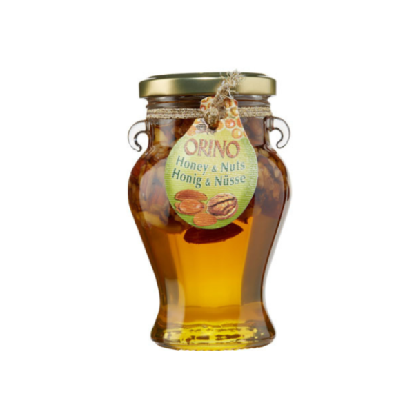 Kretenzische honing met knapperige noten. Puur, aromatisch en ideaal voor yoghurt, desserts, kaas, ontbijt en wafels. Authentieke smaak uit Kreta.