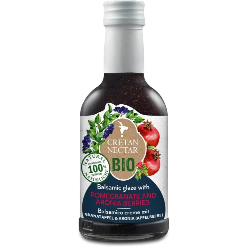 Glazen fles biologische balsamicocrème van Cretan Nectar, 200 ml, met granaatappel en aroniabessen, afkomstig uit Kreta, geschikt voor salades, vlees en yoghurt.