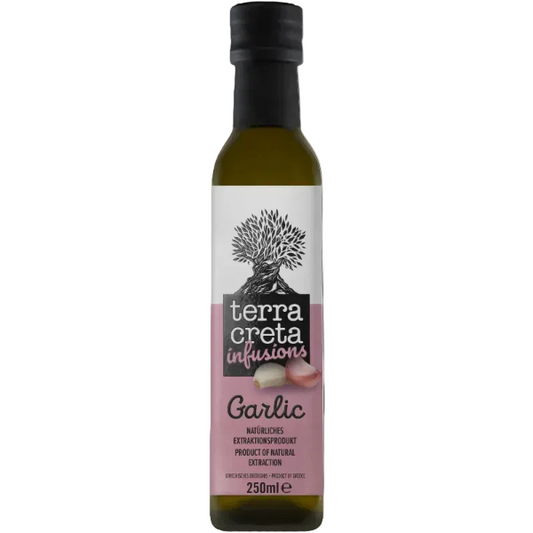 Aromatische knoflook‑infused Extra Vierge Olijfolie van Terra Creta. Gemaakt van Koroneiki‑olijven uit Kolymvari. Perfect voor pasta, vlees, dips en mediterrane marinades. 250 ml.